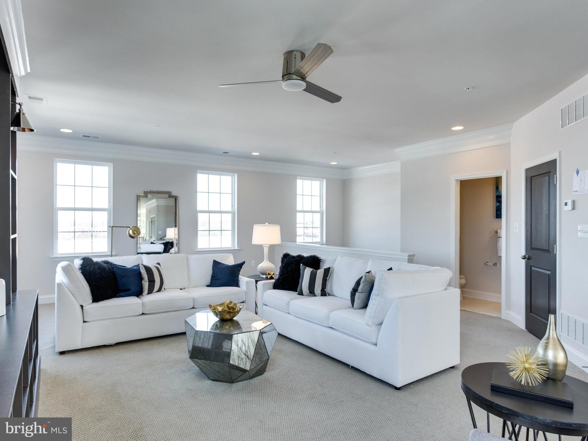 1709 Fieldstone Court Hanover, MD 21076 - Photo 4 of 19 a living room with furniture and a large window