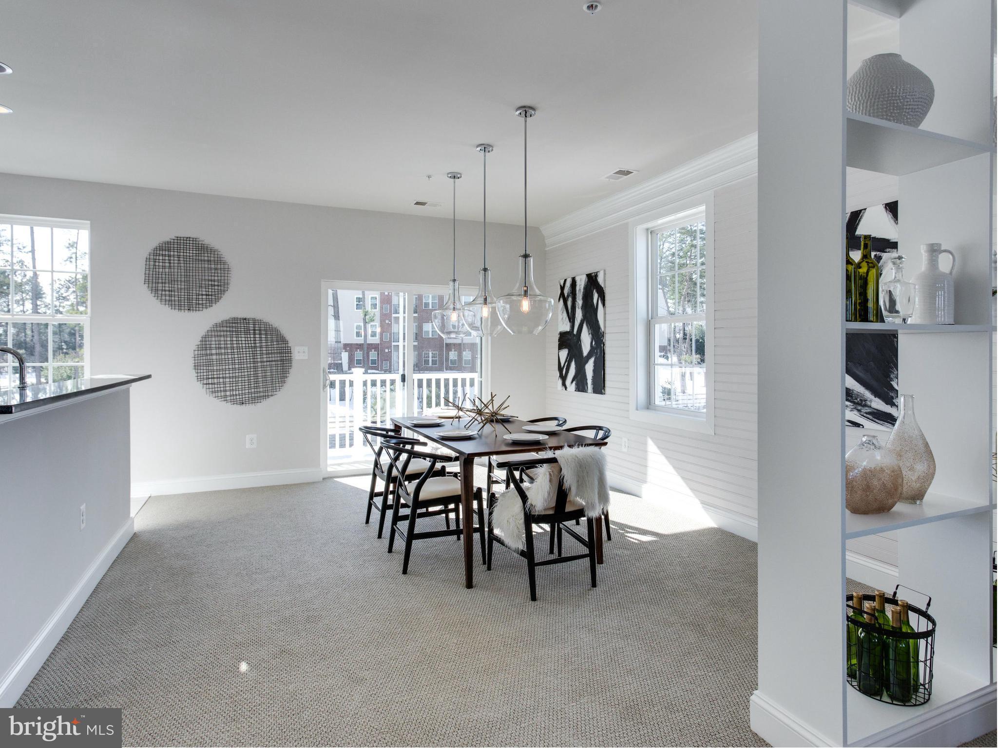 1709 Fieldstone Court Hanover, MD 21076 - Photo 6 of 19 a dining room with furniture and a window