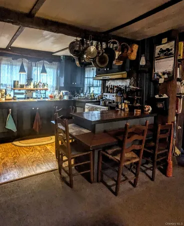 a view of a chairs and table in a room