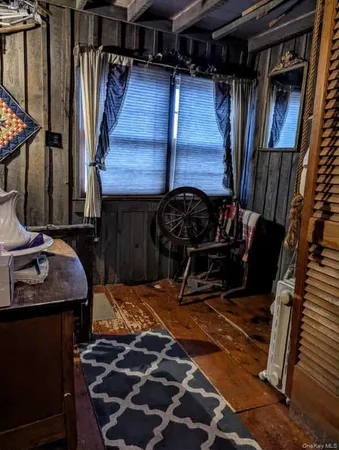 a room with lots of different colored cloths