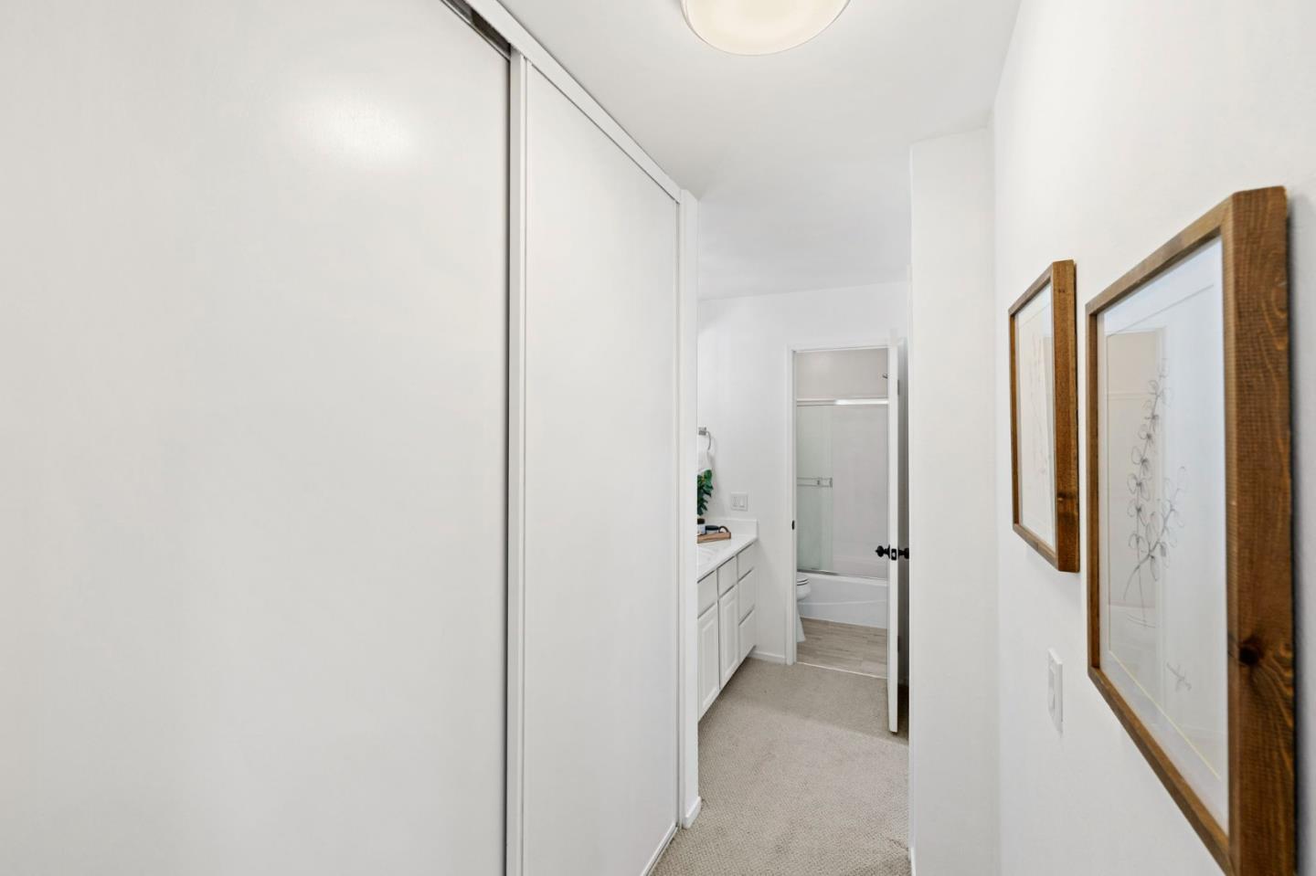 380 Vallejo Drive, Unit 321 Millbrae, CA 94030 - Photo 16 of 38 a bathroom with a shower and a glass door