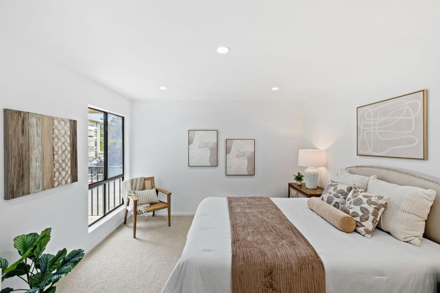 380 Vallejo Drive, Unit 321 Millbrae, CA 94030 - Photo 18 of 38 a bedroom with a bed and a large window