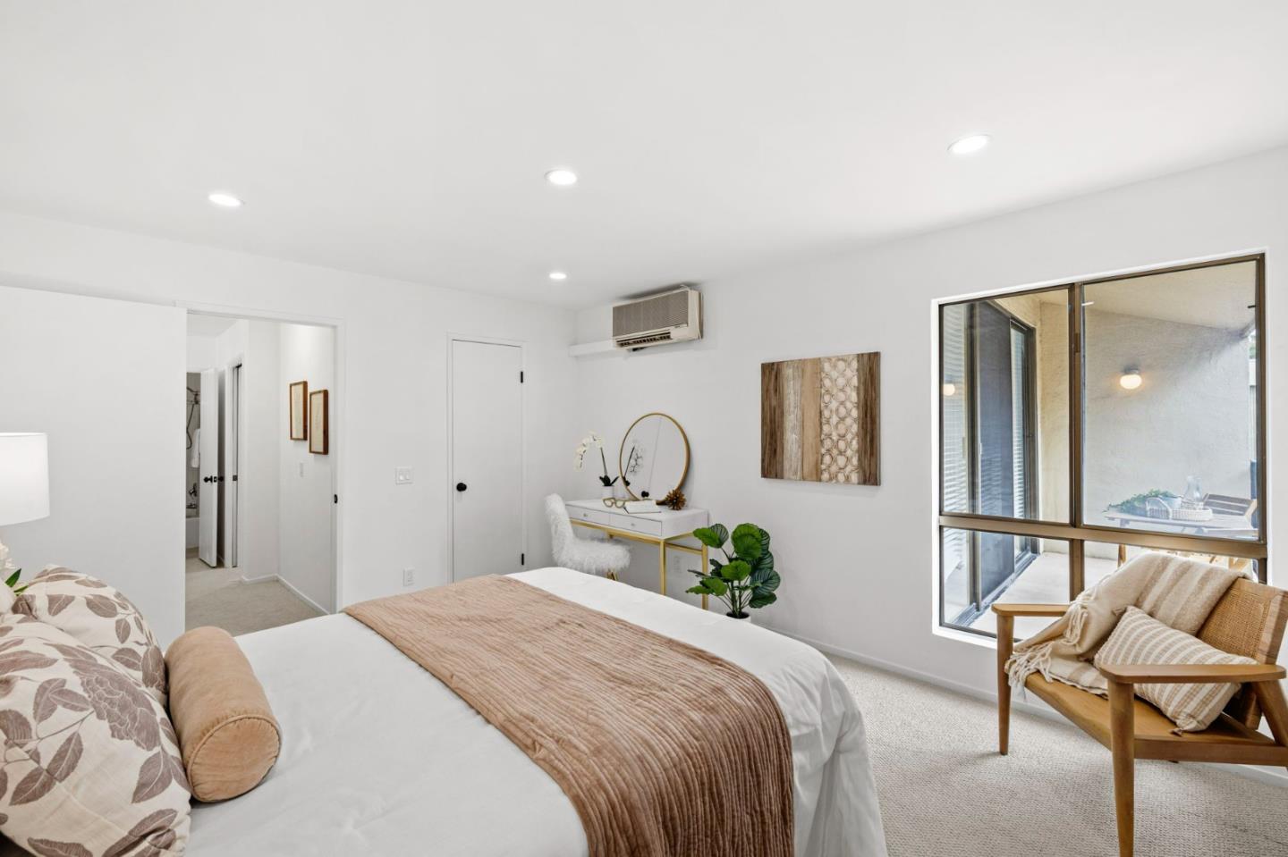 380 Vallejo Drive, Unit 321 Millbrae, CA 94030 - Photo 19 of 38 a bedroom with a bed and a chair