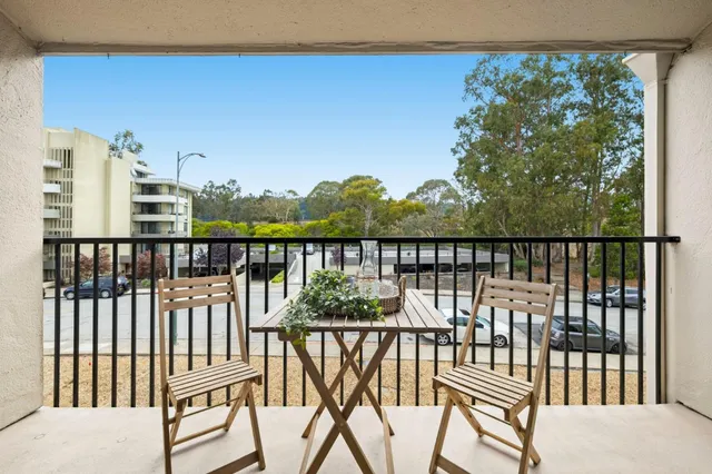a view of a balcony with lake view