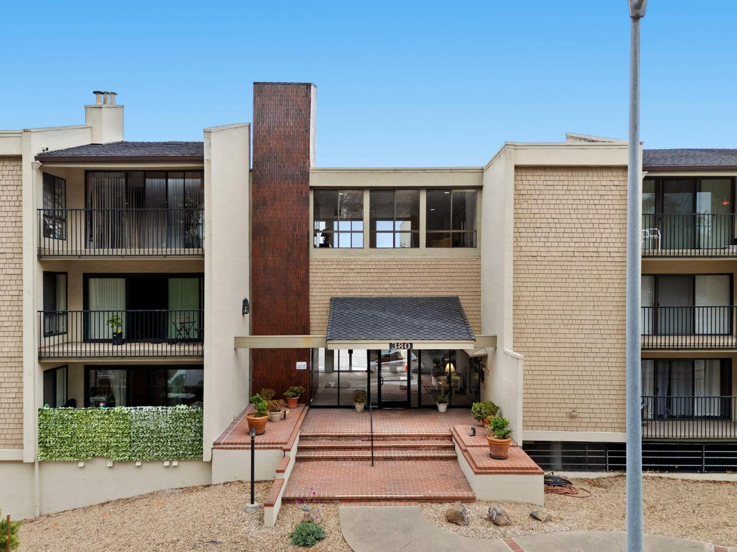 380 Vallejo Drive, Unit 321 Millbrae, CA 94030 - Photo 27 of 38 a front view of a house with garage