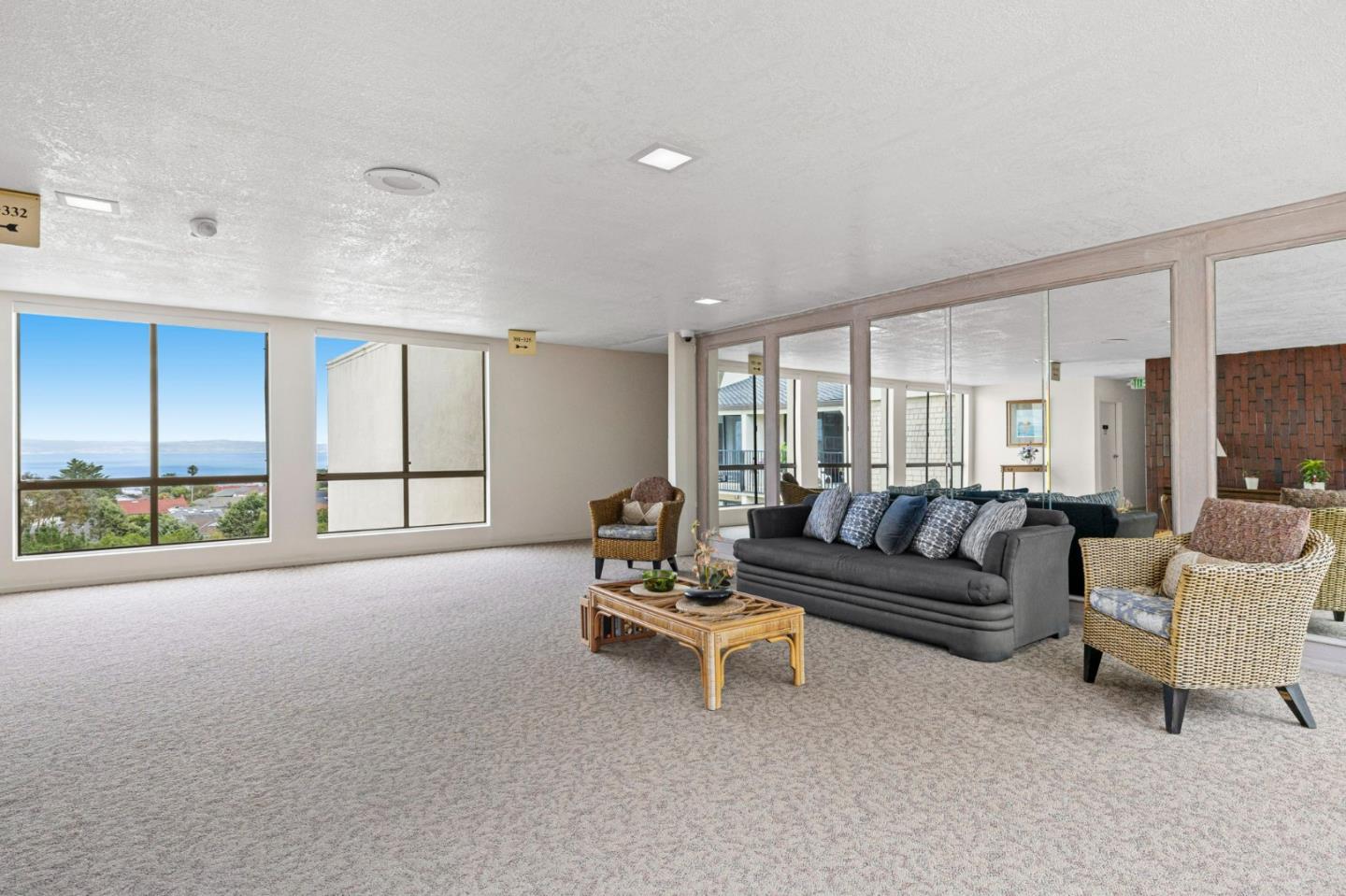 380 Vallejo Drive, Unit 321 Millbrae, CA 94030 - Photo 30 of 38 a living room with furniture and a large window