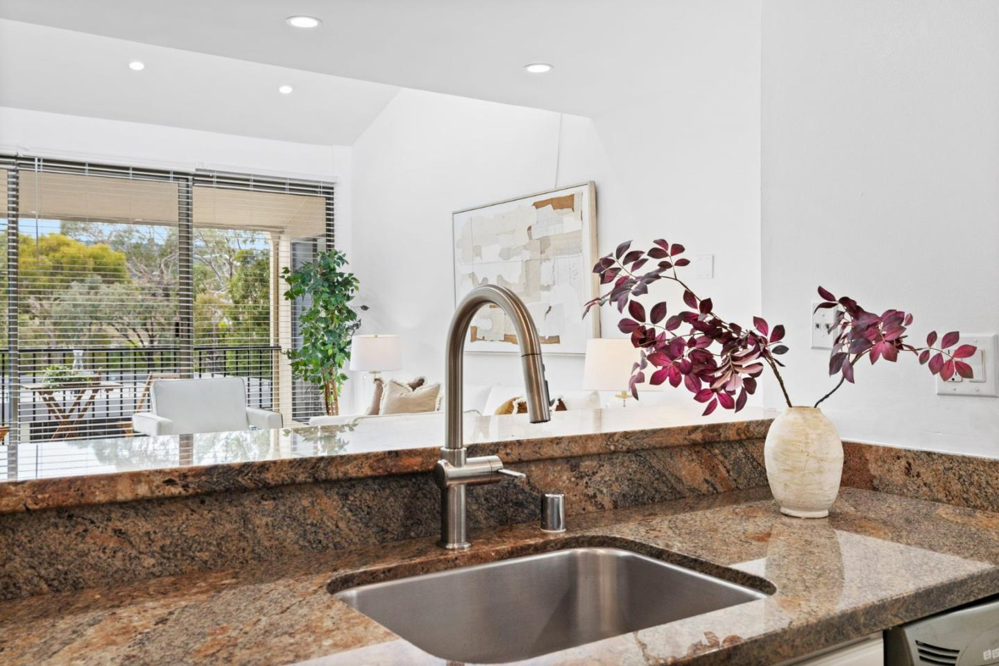 380 Vallejo Drive, Unit 321 Millbrae, CA 94030 - Photo 10 of 38 a kitchen with a sink and a large window