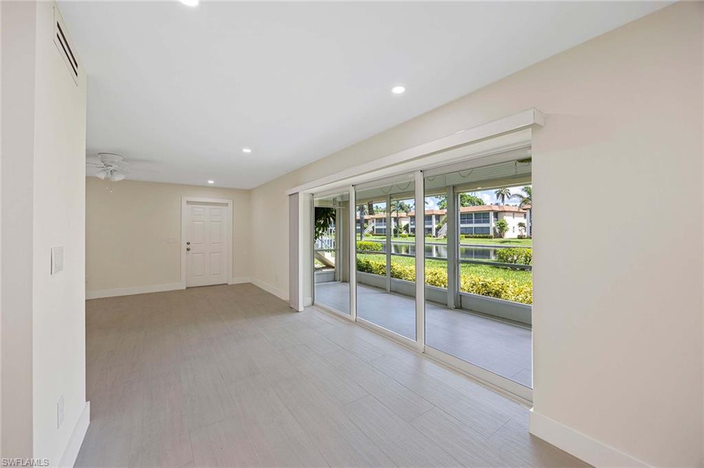 1155 Sandpiper Street, Unit F7 Naples, FL 34102 - Photo 13 of 29 a view of an empty room with a window