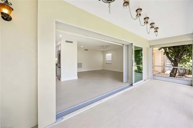 a view of a porch and garden