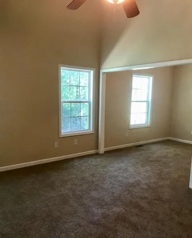 an empty room with windows