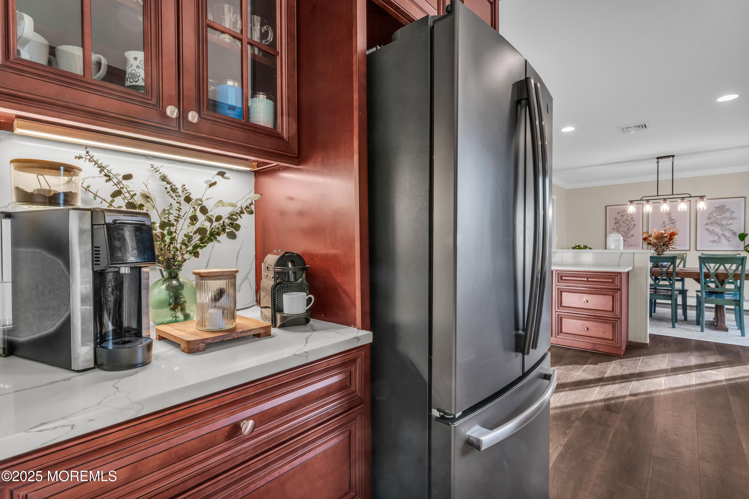 636 Donald Street Brick, NJ 08723 - Photo 9 of 32 a kitchen with refrigerator and table