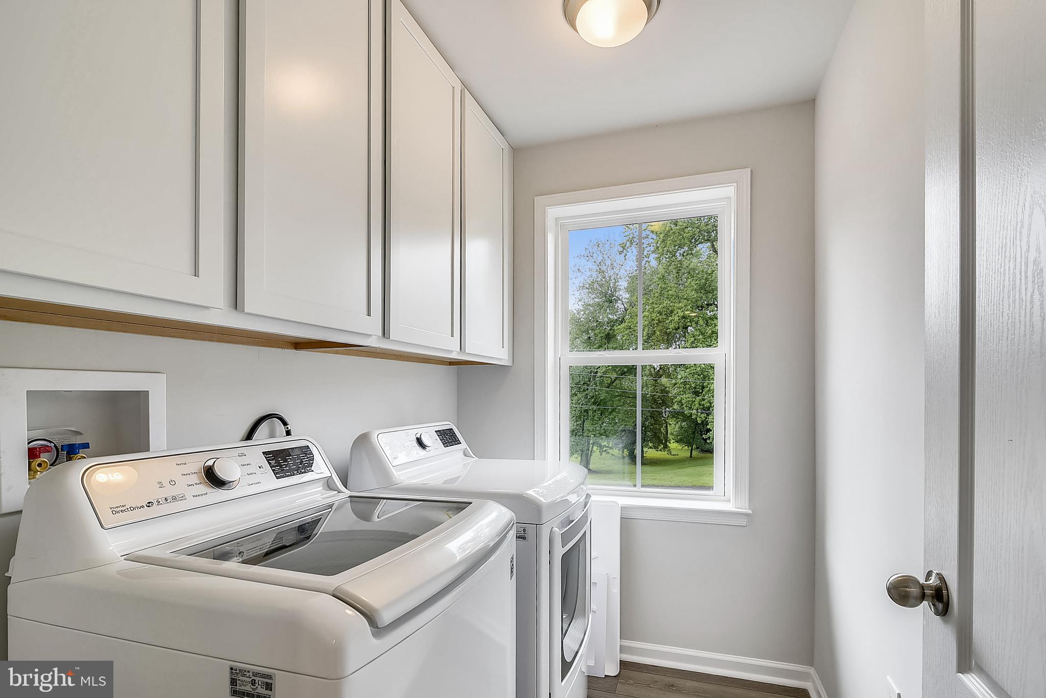 13814 Pecan Ridge Way Bowie, MD 20715 - Photo 10 of 14 a utility room with dryer and washer