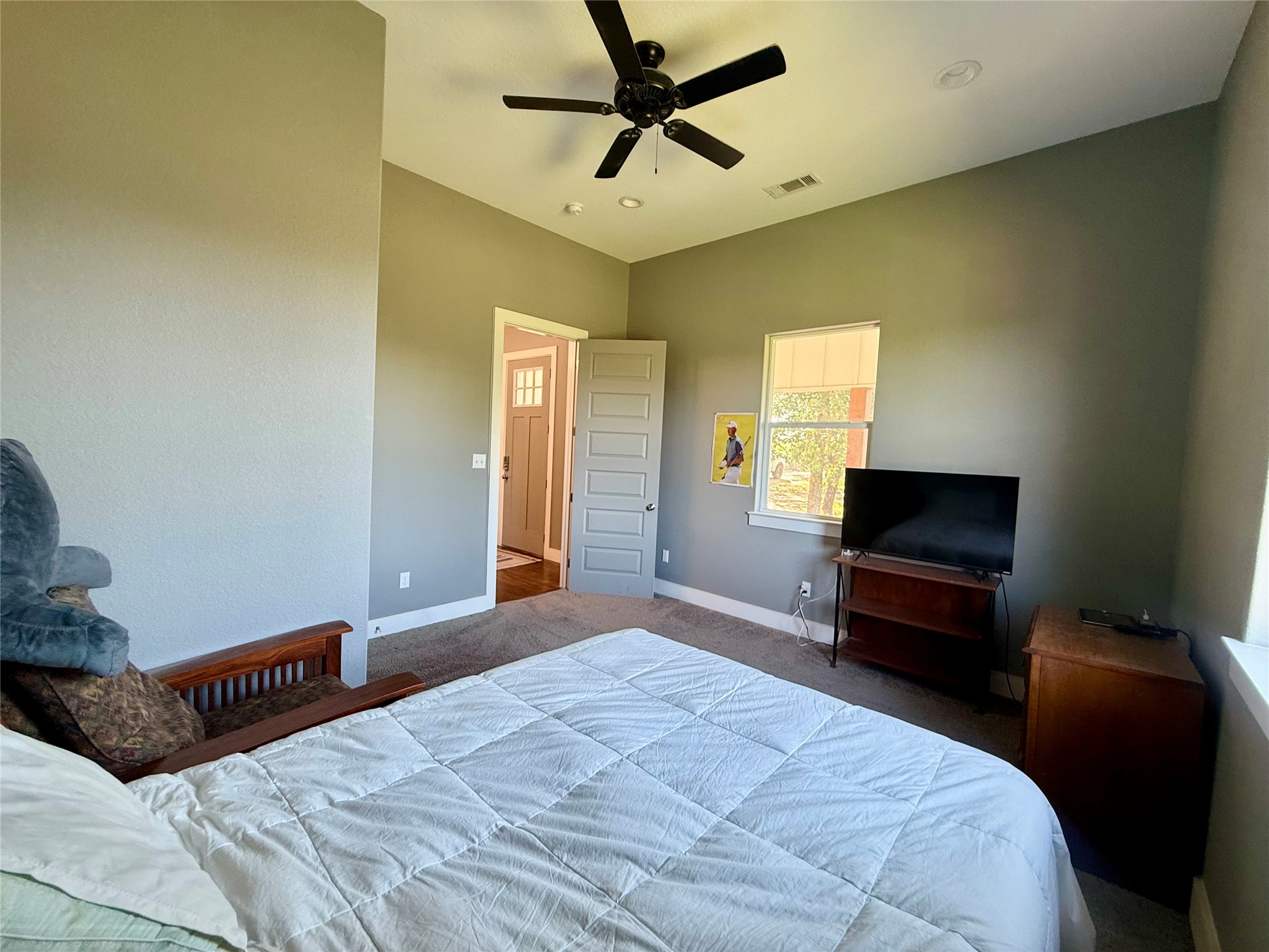 739 Pleasant Grove Road Elgin, TX 78621 - Photo 16 of 29 Carpeted room featuring a vaulted ceiling with a ceiling fan, recessed lighting, and a window with white trim