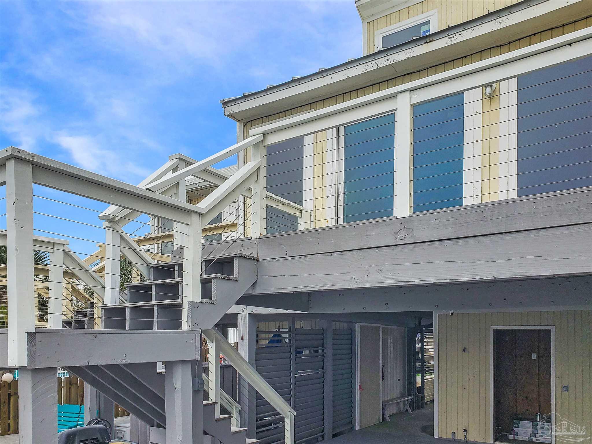 7200 Sharp Reef, Unit 2 Pensacola, FL 32507 - Photo 21 of 24 a front view of a building