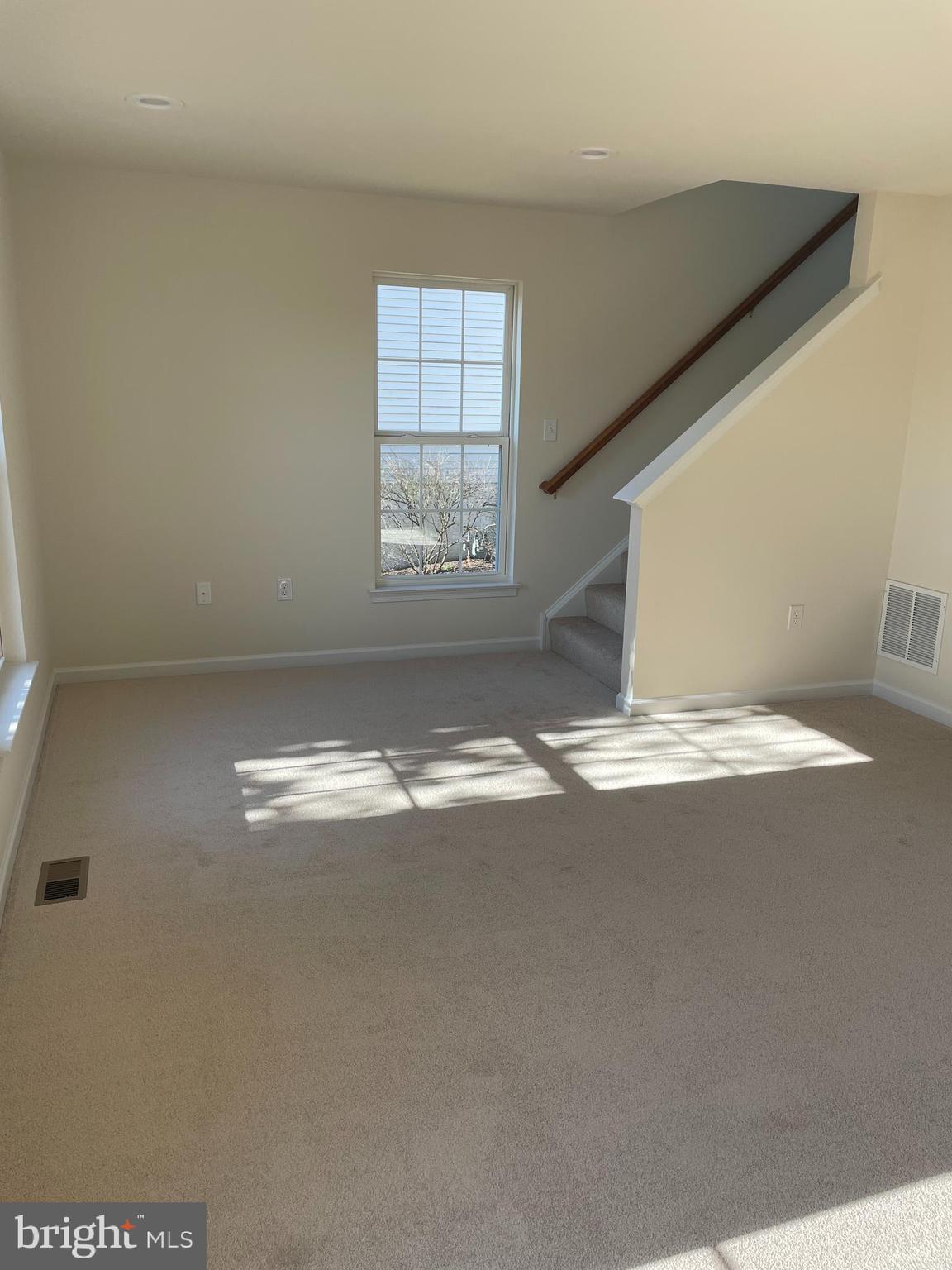 17 Chaser Court Reading, PA 19607 - Photo 8 of 14 Family Room and Stairs to Upper Floor