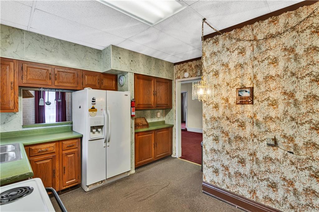 733 North Warren Avenue Apollo, PA 15613 - Photo 16 of 29 a utility room with refrigerator and washer