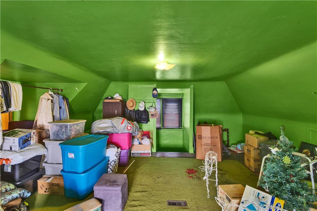 733 North Warren Avenue Apollo, PA 15613 - Photo 25 of 29 a room with lots of potted plants and a fountain