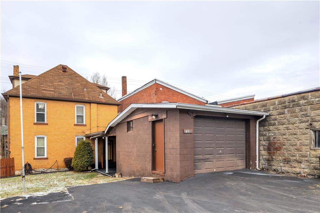 733 North Warren Avenue Apollo, PA 15613 - Photo 5 of 29 a front view of a house with a yard