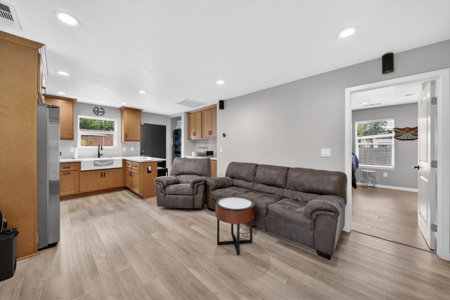 919 Old Canyon Road Fremont, CA 94536 - Photo 31 of 55 a living room with furniture and kitchen view