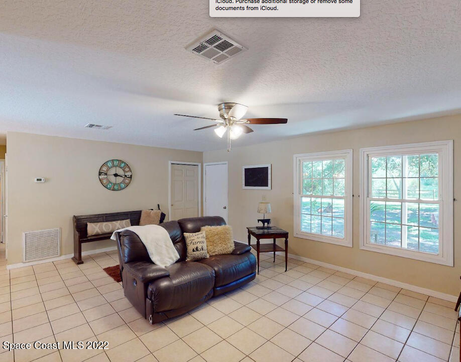 2005 Cox Road Cocoa, FL 32926 - Photo 16 of 35 a living room with furniture and a window