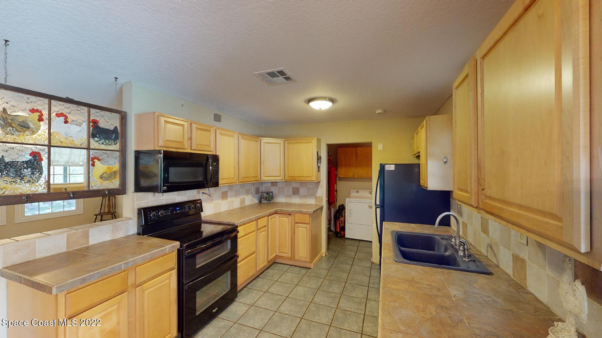 2005 Cox Road Cocoa, FL 32926 - Photo 18 of 35 2005-Cox-Rd-kitchen