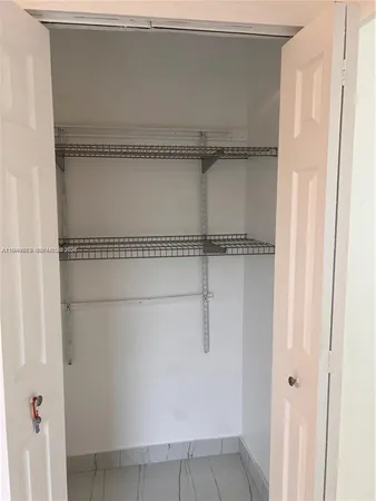 a bathroom with a sink and a shower