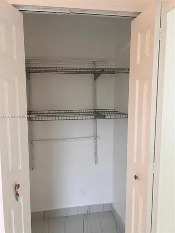 a bathroom with a sink and a shower