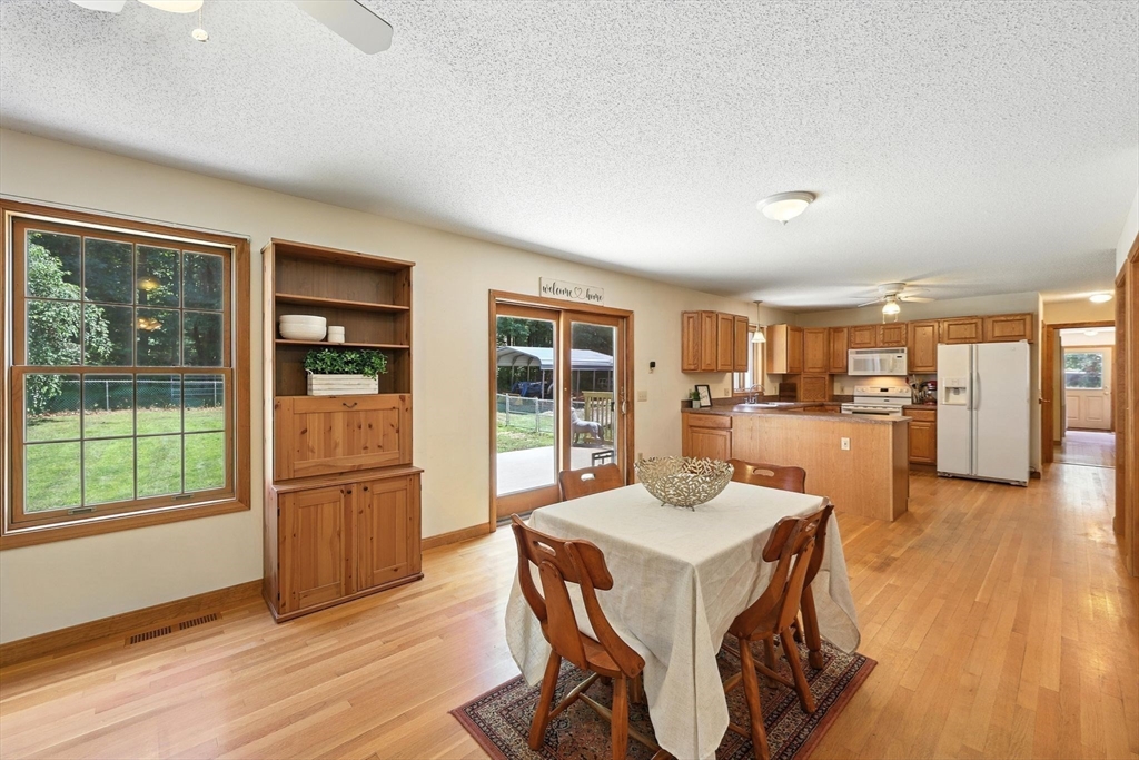 285 Lower Hampden Road Monson, MA 01057 - Photo 14 of 40 a view of a dining room with furniture window and wooden floor