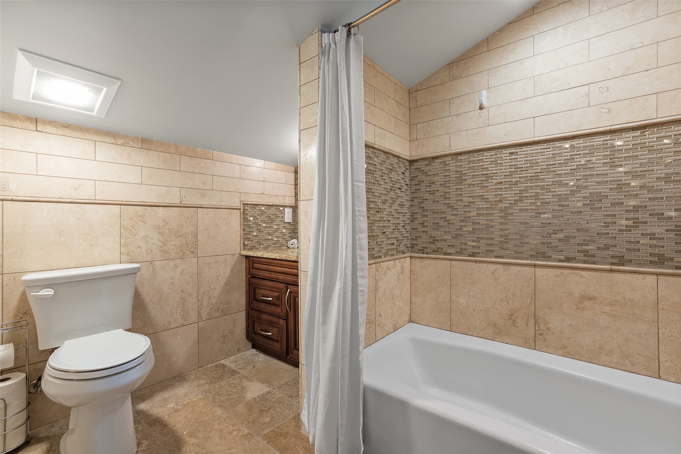 15303 Faubion Trail Leander, TX 78641 - Photo 18 of 39 a bathroom with a toilet and a shower