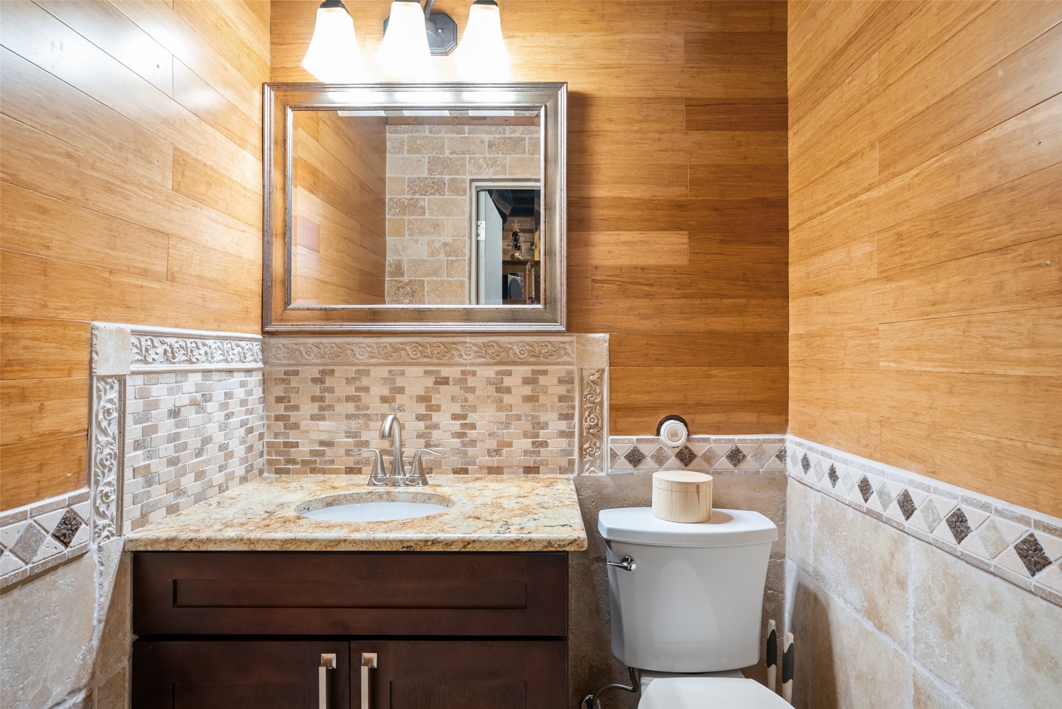 15303 Faubion Trail Leander, TX 78641 - Photo 23 of 39 a bathroom with a sink and a toilet