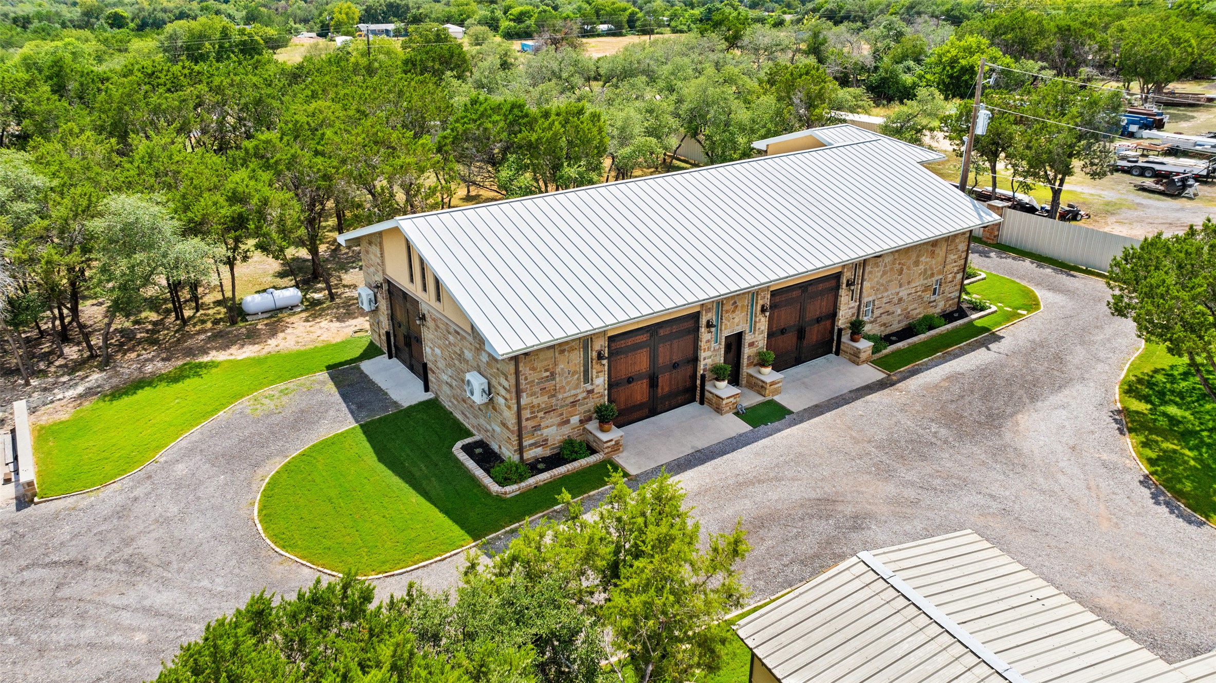 15303 Faubion Trail Leander, TX 78641 - Photo 3 of 39 an aerial view of a house with a yard and potted plants