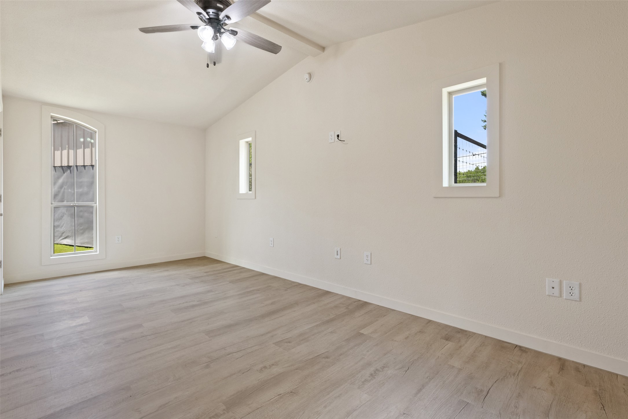 15303 Faubion Trail Leander, TX 78641 - Photo 36 of 39 wooden floor in an empty room with a window