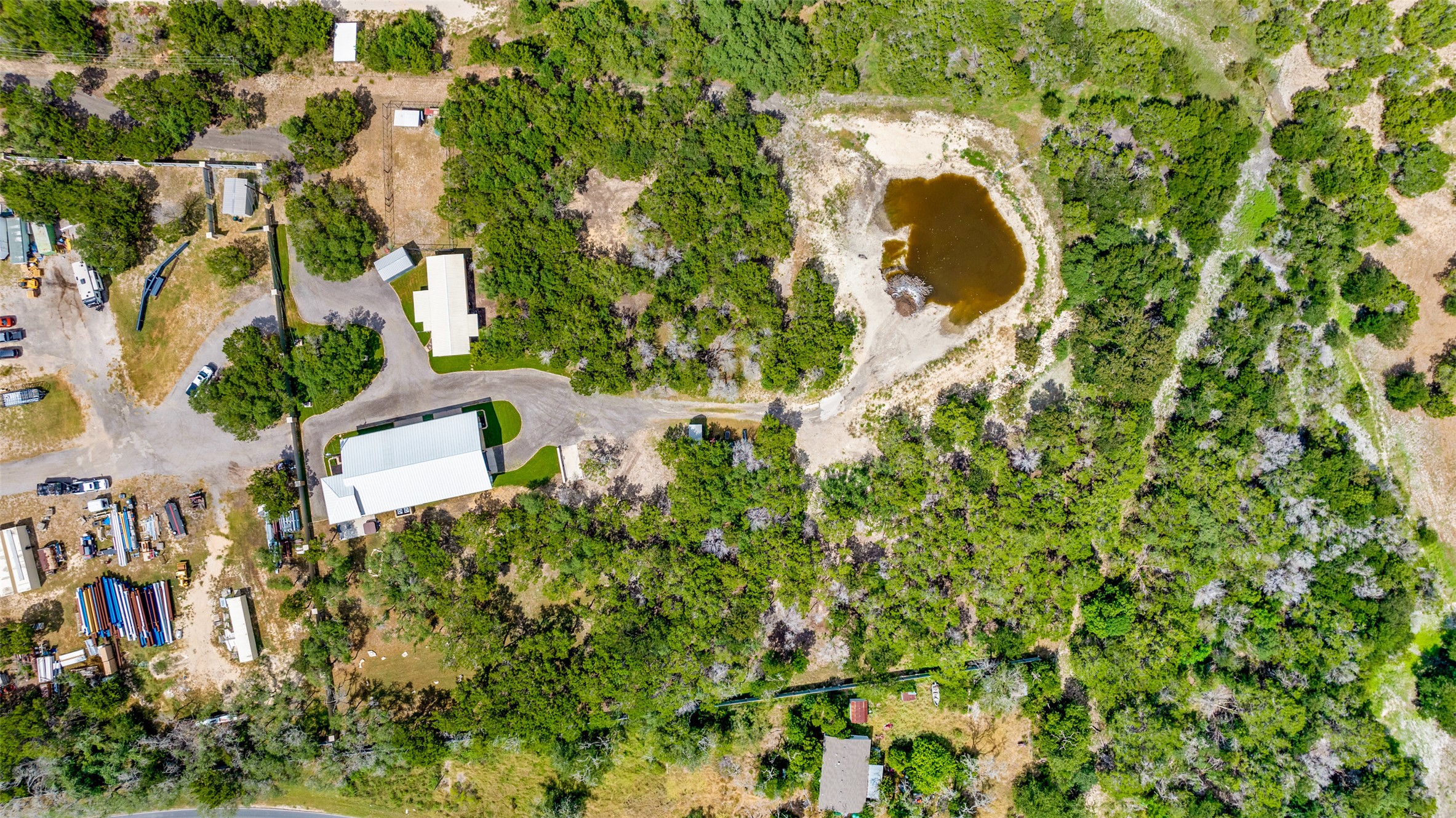 15303 Faubion Trail Leander, TX 78641 - Photo 39 of 39 an aerial view of a house with a yard and swimming pool