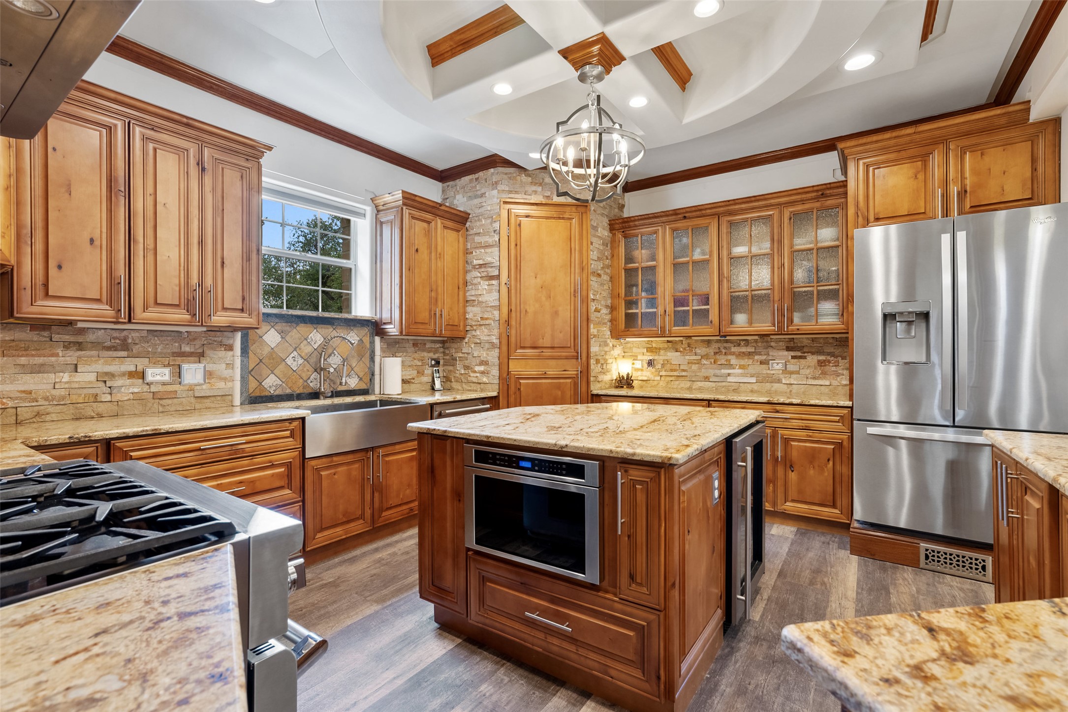 15303 Faubion Trail Leander, TX 78641 - Photo 7 of 39 a kitchen with stainless steel appliances granite countertop a stove and refrigerator