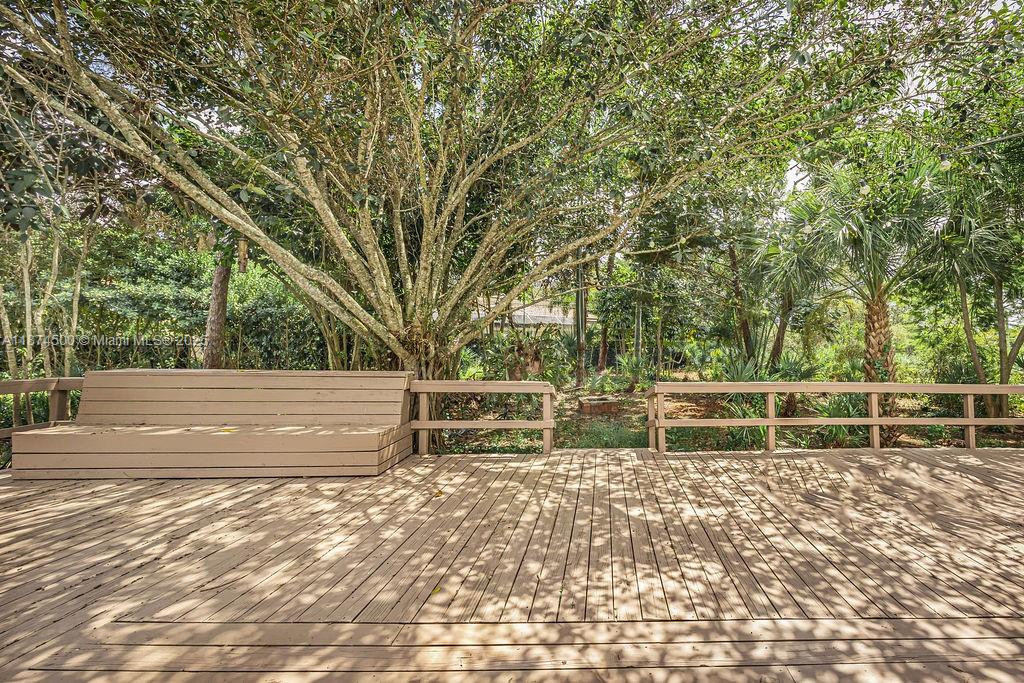 4882 Southeast Bayshore Terrace Stuart, FL 34997 - Photo 11 of 56 a view of outdoor space with garden