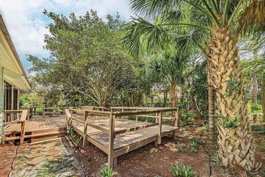 4882 Southeast Bayshore Terrace Stuart, FL 34997 - Photo 18 of 56 a view of outdoor space with seating