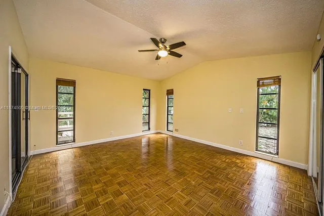 a bathroom with a shower and a bath tub