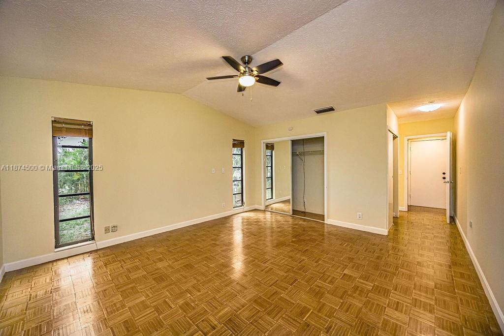 4882 Southeast Bayshore Terrace Stuart, FL 34997 - Photo 35 of 56 a view of an empty room with window and cabinet