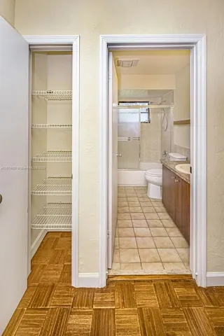 an aerial view of a house with a yard and garden