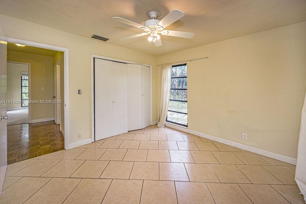 4882 Southeast Bayshore Terrace Stuart, FL 34997 - Photo 47 of 56 a view of an empty room with a bathroom