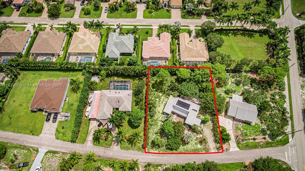 4882 Southeast Bayshore Terrace Stuart, FL 34997 - Photo 50 of 56 an aerial view of multiple house