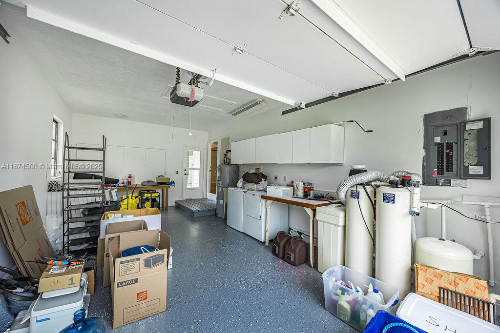 4882 Southeast Bayshore Terrace Stuart, FL 34997 - Photo 53 of 56 a view of a room with gym equipment