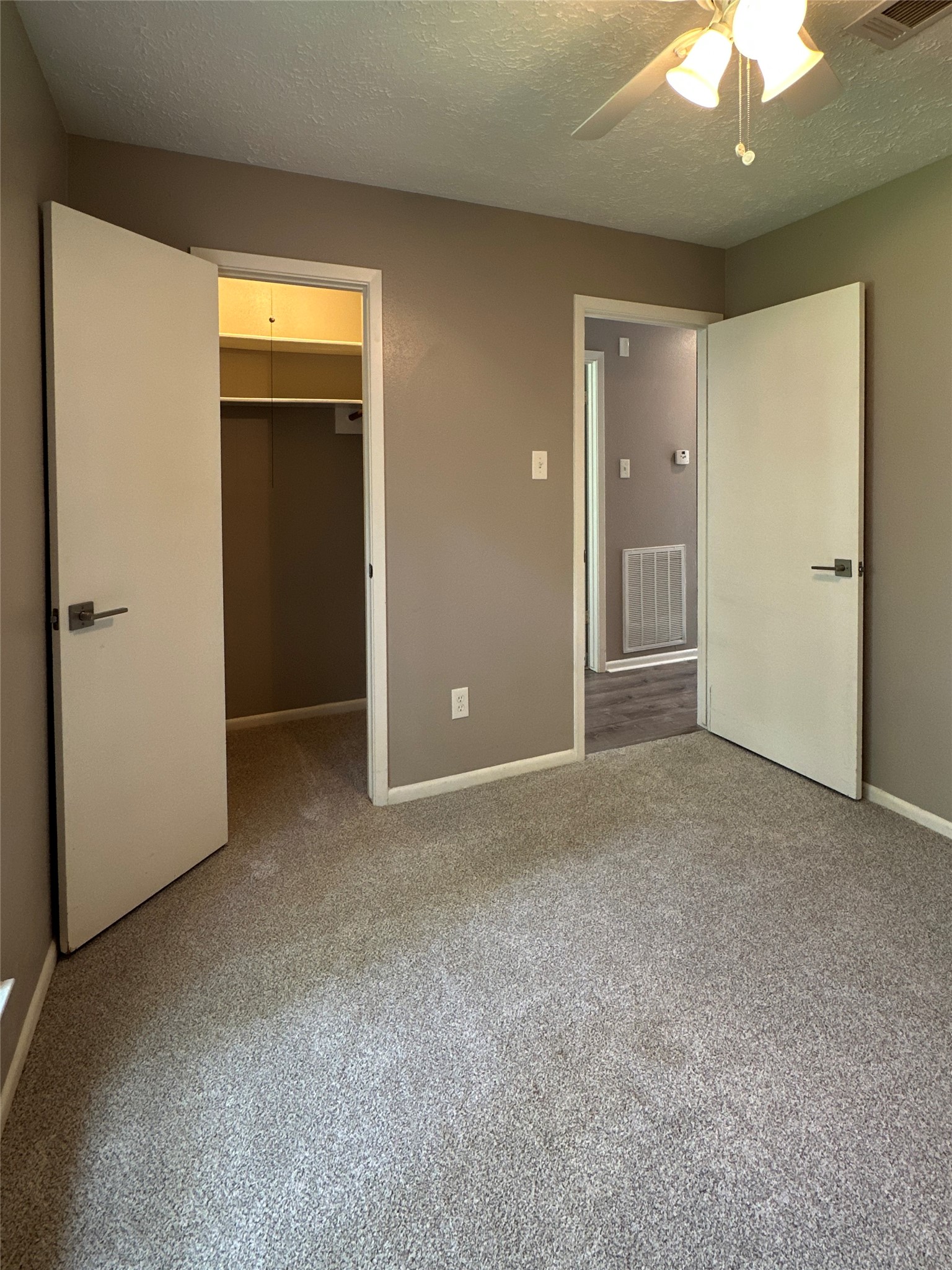 26403 Hunters Hollow Drive Spring, TX 77380 - Photo 19 of 34 Guest bedroom 1, closet and entry view