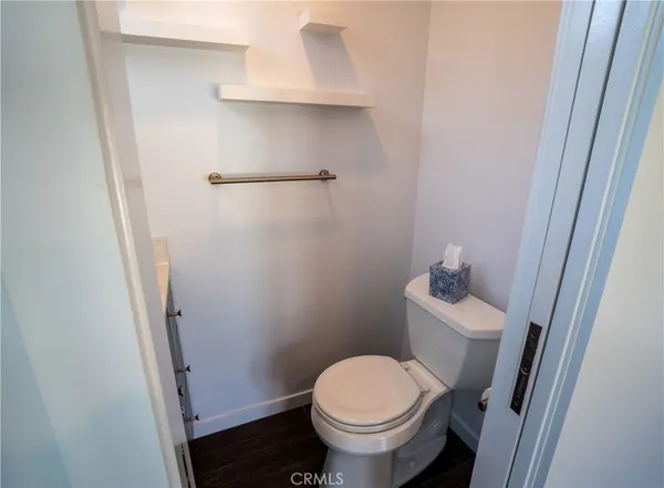 a bathroom with a toilet and a sink