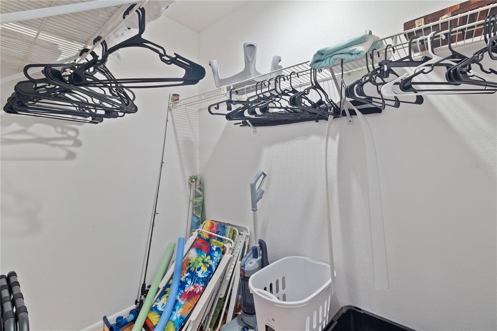 1531 Placida Road, Unit 203 Englewood, FL 34223 - Photo 26 of 28 a bathroom with a sink a toilet and a mirror
