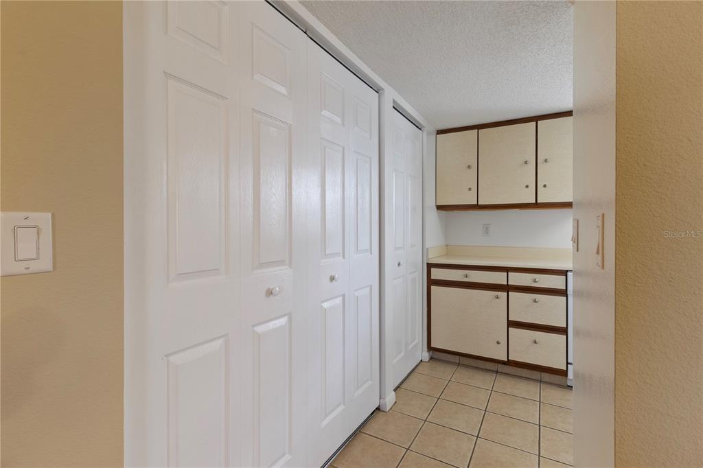 1531 Placida Road, Unit 203 Englewood, FL 34223 - Photo 10 of 28 a view of cabinets and window
