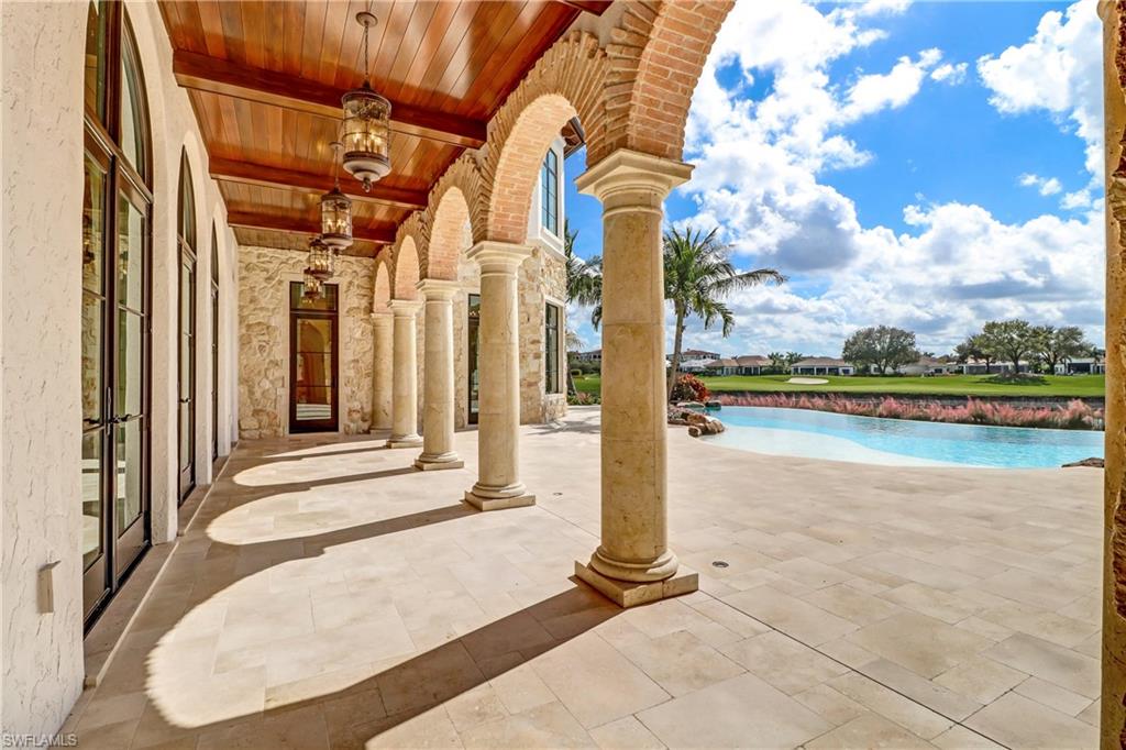 16622 Firenze Way Naples, FL 34110 - Photo 16 of 35 a view of a entrance door of the building