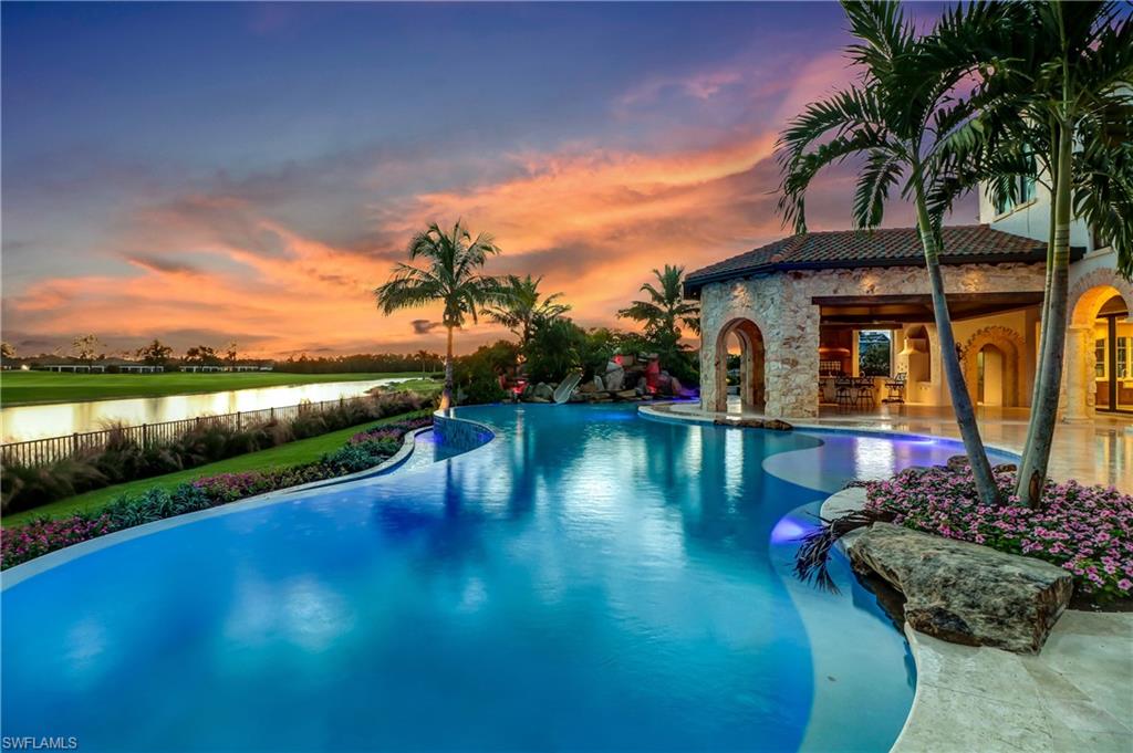 16622 Firenze Way Naples, FL 34110 - Photo 2 of 35 a view of a house with swimming pool and a yard