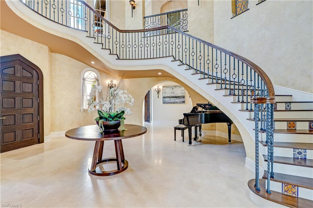 16622 Firenze Way Naples, FL 34110 - Photo 9 of 35 a view of hall way with furniture