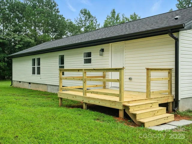 a view of a backyard with a garden